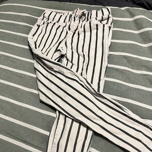 Girls black and white striped skinny jeans